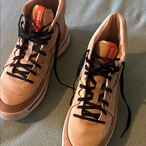 Sorel women Tan and Black High-Top Sneakers with Orange Tongue Tag